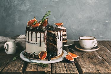 Chocolate cake featuring figs and blackberries