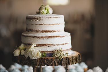 Wedding cake on wooden base