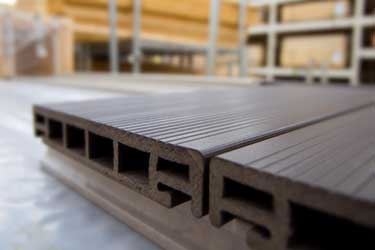 Close up of composite decking timber in warehouse
