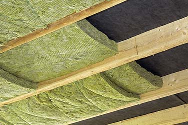 Eco friendly insulation installed neatly in wooden ceiling