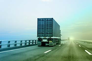 Secure transportation truck drives shipment to destination